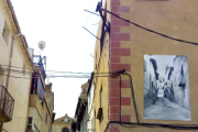 Una de las calles de L’Albi con una foto antigua. 