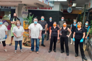 Foto de familia de los paradistas del mercado municipal de Ronda-Fleming. 