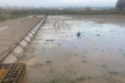 La zona de la graella de sortida estava completament negada per la pluja.