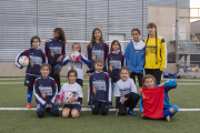 L’equip femení del Guissona i la seua entrenadora Sabina Morera.