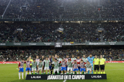 Els jugadors del Betis i el Girona van posar amb el lema ‘Guanya-t’ho al camp’ contra la Superlliga.