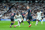 Bernardo Silva i Haaland, en una acció davant del madridista Mendy.