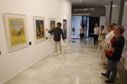 Visita guiada 'familiar' a la mostra a Lleida de cartells de Roig Nadal