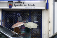 Vista de la administración de lotería de Lugo donde el pasado 4 de enero dos encapuchados se llevaron cerca de 400.000 euros y cuyo propietario ha sido detenido por la Policía Nacional como principal sospechoso del atraco.