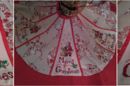 Peu d'arbre de Nadal confeccionat amb tres peces de tela aida brodades en punt de creu i entreteixides amb tela estampada i cinta vermella.