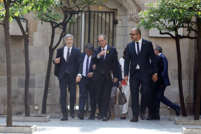 El ministre de l'Interior, Fernando Grande-Marlaska; el president de la Generalitat, Quim Torra, i el conseller de l'Interior, Miquel Buch, abans de la reunió de la junta de seguretat.