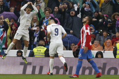 Cristiano celebra uno de sus goles ante el Sporting.