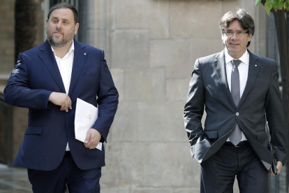 El president de la Generalitat, Carles Puigdemont, i el vicepresident, Oriol Junqueras.