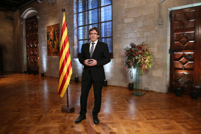 El President Puigdemont, ayer durante su alocución de Fin de año desde el Palau de la Generalitat de Barcelona.