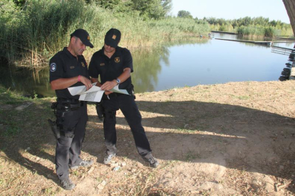 Agents policials buscant restes de la víctima a la Mitjana i a Utxesa entre el juliol i l’octubre del 2011.