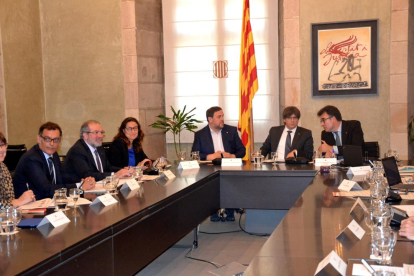 Reñé va firmar el conveni amb Junqueras i el president Puigdemont.