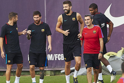 Messi, Jordi Alba y Piqué ayer durante el entrenamiento.