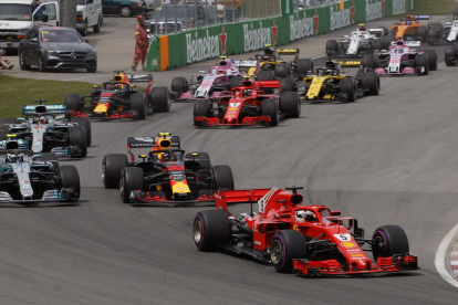 Sebastian Vettel celebra su triunfo en el Gran Premio de Canadá, donde se hizo con el liderato del Mundial.