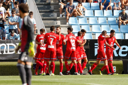 Los jugadores del Espanyol celebran el primer gol del partido, que les permitió sumar un punto en Balaidos.