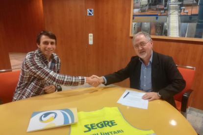 Miquel Gimeno i Juan Cal signen el conveni de col·laboració