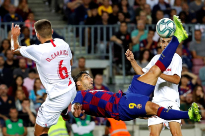 Luis Suárez va marcar un golàs per inaugurar el marcador, amb una xilena davant de la qual no va poder fer res la defensa sevillista.