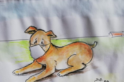 ‘Rovelló’ y un gato, dibujados ayer por Vallverdú en el Día del Libro Infantil.