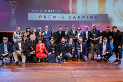 Los galardonados, posando en el escenario del CaixaForum en Barcelona.