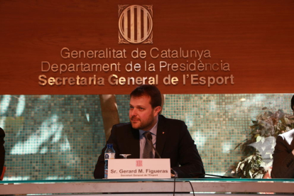 Figueras, junto a dos altos directivos catalanes del COI, Joan Antoni Samaranch y Pere Miró.