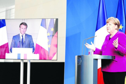 Macron i Merkel van fer ahir l’anunci en una compareixença simultània des de París i Berlín.