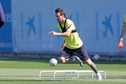 Leo Messi, durant l’entrenament del Barcelona, ahir a la Ciutat Esportiva.