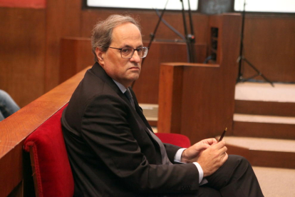 El president de la Generalitat, Quim Torra, aquest dilluns al banc dels acusats al TSJC.