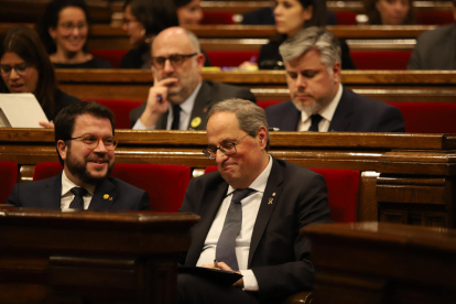 Aragonès y Torra, el pasado mes de febrero, en una sesión en el Parlament.