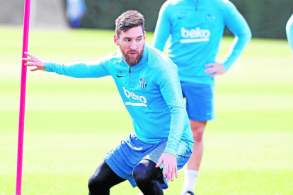 Leo Messi va tornar als entrenaments amb els companys del Barça.
