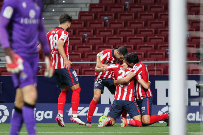 Jugadores del Atlético celebran uno de sus goles.