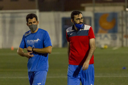 Jordi López “Mena” (derecha), durante la sesión de ayer.