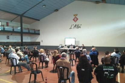 La jornada de Almatret (arriba) y la charla en L’Albi. 