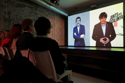 Jordi Sànchez i Carles Puigdemont, durant la videoconferència que van protagonitzar ahir.
