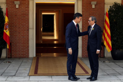 El presidente del Gobierno español y el de la Generalitat, en el Palacio de la Moncloa en julio de 2018.