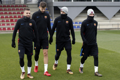 Jordi Alba, Gerard Piqué, Luis Suárez y Leo Messi, en el entrenamiento.
