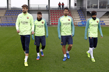 Piqué, Messi, Suárez  y Neymar ayer durante el entrenamiento de la plantilla azulgrana.