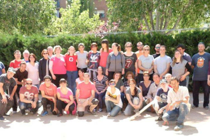 Padres, madres y miembros de la comunidad educativa de la Escola Bressol Municipal la Mitjana.