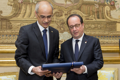 Imagen de Antoni Martí junto a François Hollande.