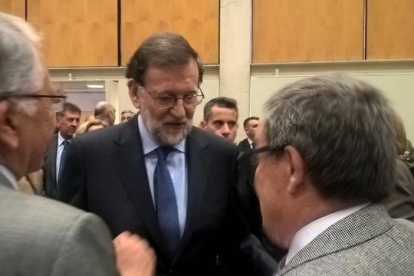 Iñigo de la Serna, Mariano Rajoy, Soraya Sáez de Santamaría y Enric Millo, ayer en Barcelona.