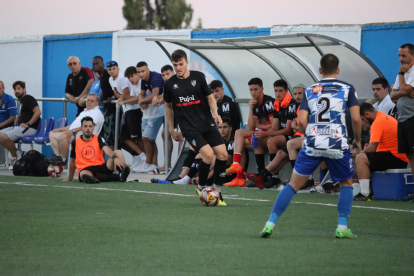 Una acció del partit d’ahir entre el Tamarit i el Mollerussa.