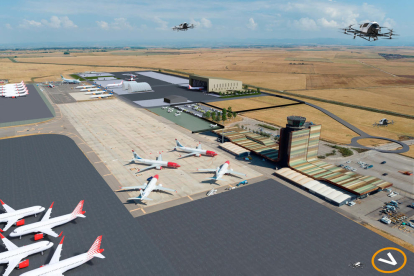Imatge virtual de les instal·lacions de l'Aeroport de Lleida-Alguaire mentre el sobrevolen diversos drons.