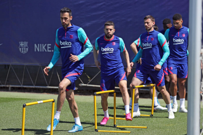 Busquets y Alba, en primer término, en foto de archivo, podrían acabar jugando en Miami con Messi.