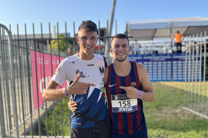 Los atletas de Tàrrega Xavier Badia y Arnau Monné, ayer en el Campeonato de España.