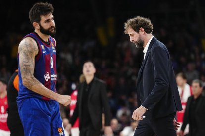 Roger Grimau i Ricky Rubio, capcots al final del partit.