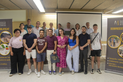 Foto de família amb els guardonats.