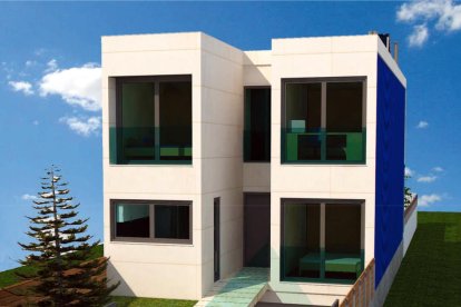 Els constructors, els promotors i l’arquitecte, davant dels contenidors que formen l’estructura de la casa de Ciutat Jardí.