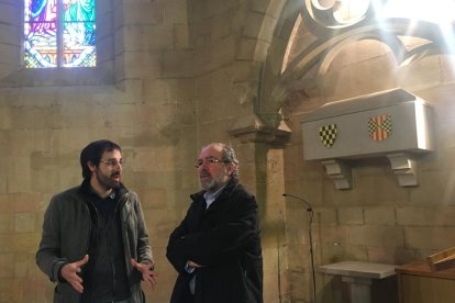 El director del monasterio de Les Avellanes, Robert Porta, y el presidente de la Diputación, Joan Reñé.