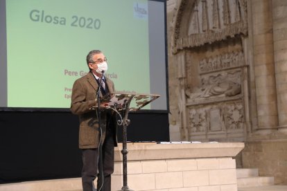 Godoy, en el momento de la lectura de la glosa.