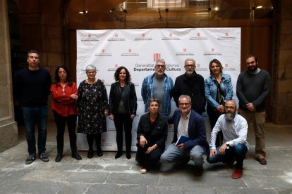 Fotografia de família amb els responsables de la investigació arqueològica.