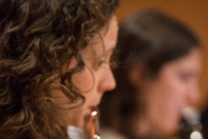 Neus Puig.Toca la flauta i és una de les gestores amb la Marta i l'Ariadna.