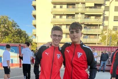 Martí amb el seu entrenador a l’Atlètic Segre, Sergi Genís.